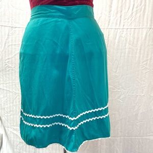 Vintage teal blue hostess apron with white bric brac ribbon trim